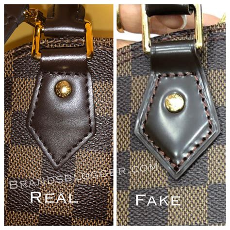 how to spot a fake alma pm louis vuitton|how to check for false Louis Vuitton.